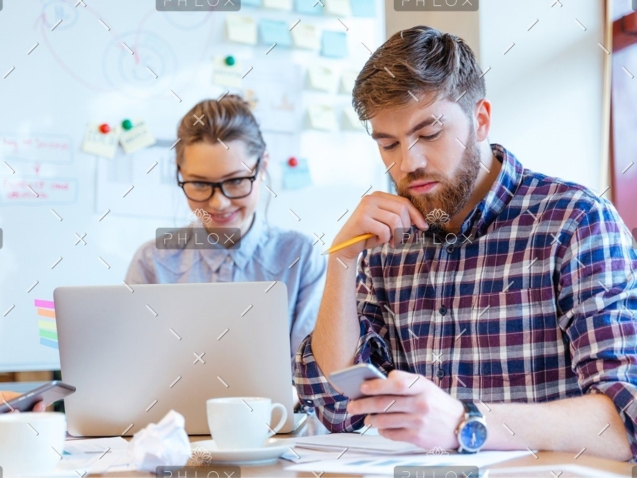 demo-attachment-406-people-working-in-office-P3DBYE3